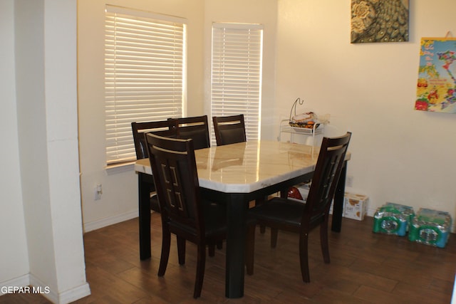 1429 Jettie Ray Way, El Paso, TX 79936 - dining space featuring dark wood-style floors and baseboards