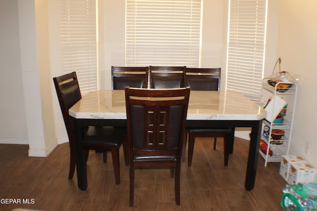 1429 Jettie Ray Way, El Paso, TX 79936 - dining space featuring dark wood-style floors and baseboards
