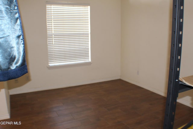 1429 Jettie Ray Way, El Paso, TX 79936 - empty room featuring wood finished floors and baseboards