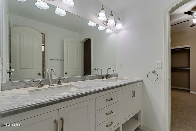 3841 Tierra Campa Dr, El Paso, TX 79938 - bathroom featuring double vanity and a ceiling fan