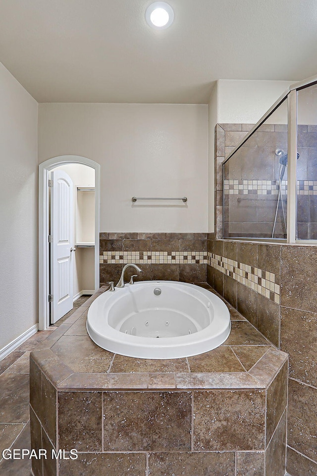 3841 Tierra Campa Dr, El Paso, TX 79938 - bathroom with a tub with jets and a tile shower
