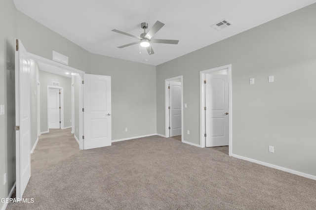 13845 Summer Wave Ave, El Paso, TX 79928 - unfurnished bedroom with light carpet, baseboards, and ceiling fan