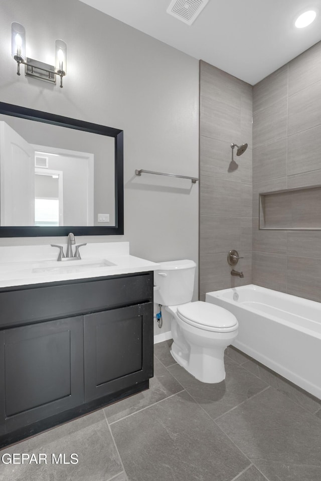 1445 Summer Storm Pl, El Paso, TX 79928 - full bath featuring toilet, vanity, tile patterned floors, and shower / bath combination