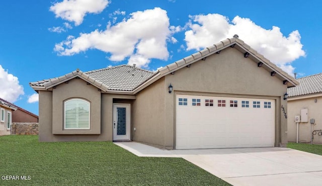 13833 Sky Harbor Ave, Horizon City, TX 79928 - mediterranean / spanish-style home featuring an attached garage, stucco siding, concrete driveway, a front lawn, and a tile roof