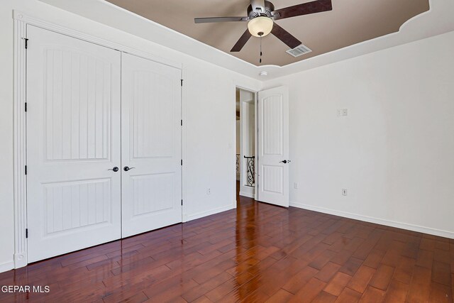 3081 Coyote Point Pl, El Paso, TX 79938 - unfurnished bedroom with a closet, wood finished floors, and a ceiling fan