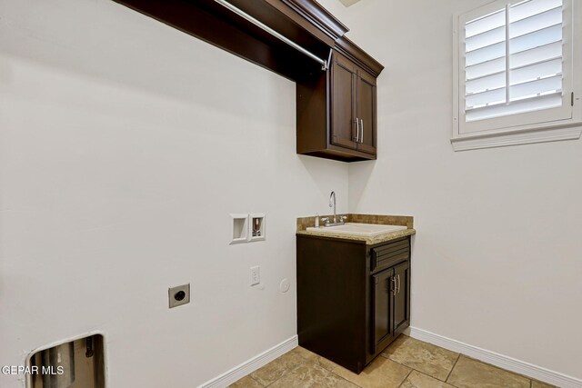 3081 Coyote Point Pl, El Paso, TX 79938 - washroom with hookup for an electric dryer, hookup for a washing machine, and cabinet space