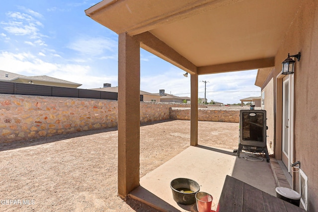 11589 Flor Cadillo, Socorro, TX 79927 - fenced backyard with a patio