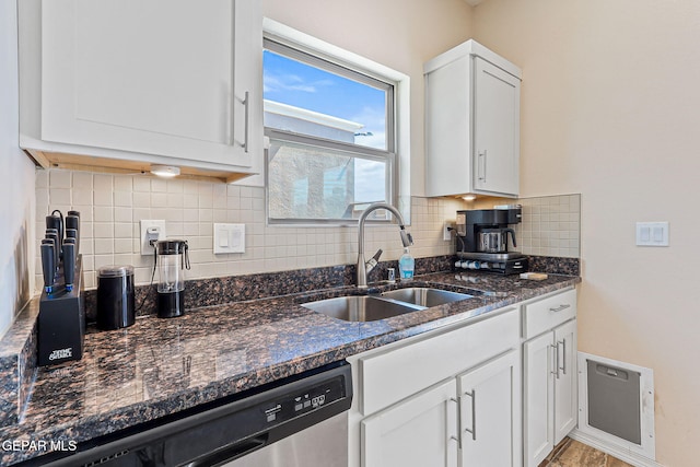 11589 Flor Cadillo, Socorro, TX 79927 - kitchen featuring dishwasher, a sink, backsplash, and white cabinets
