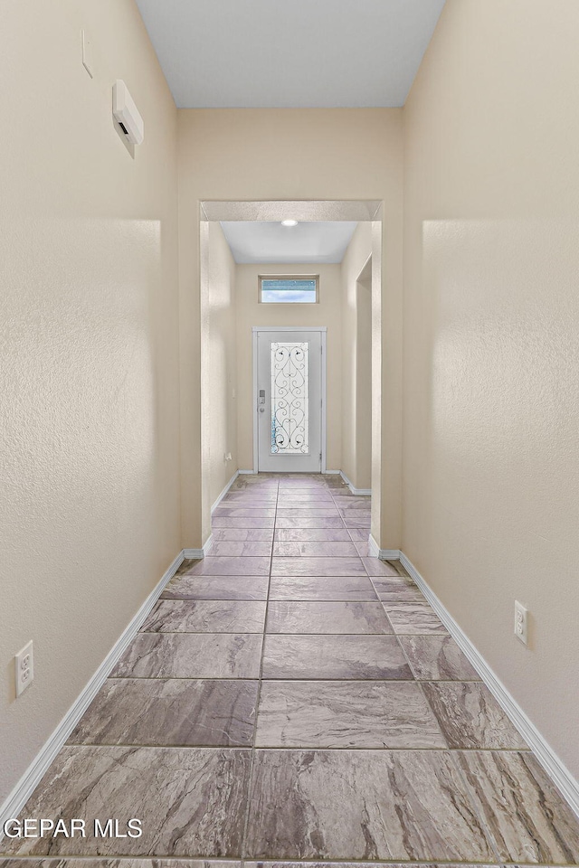 11589 Flor Cadillo, Socorro, TX 79927 - doorway to outside with baseboards