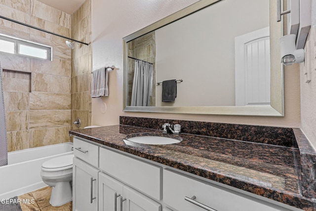 11589 Flor Cadillo, Socorro, TX 79927 - full bath featuring vanity, toilet, and shower / bath combo with shower curtain