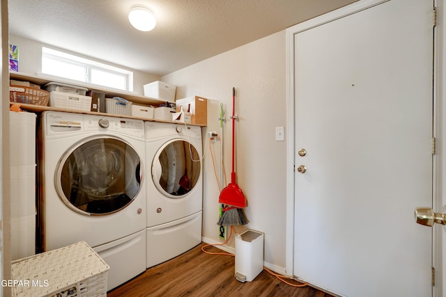 13261 Walker Post Ave, El Paso, TX 79928 - washroom featuring washer and dryer and wood finished floors