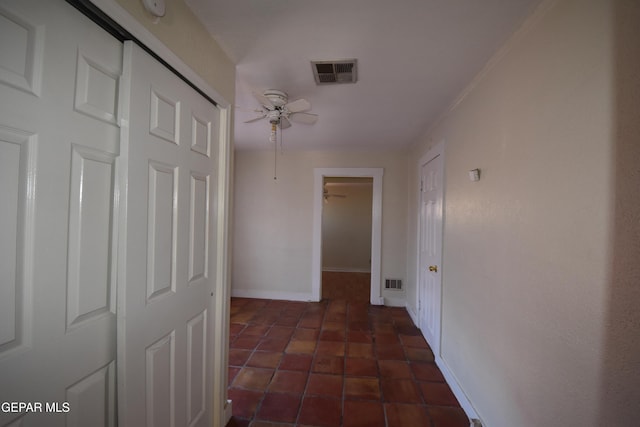 1275 Prospect St, El Paso, TX 79902 - hall featuring baseboards and dark tile patterned flooring