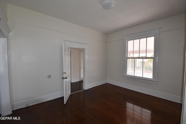 1275 Prospect St, El Paso, TX 79902 - empty room with baseboards and wood finished floors