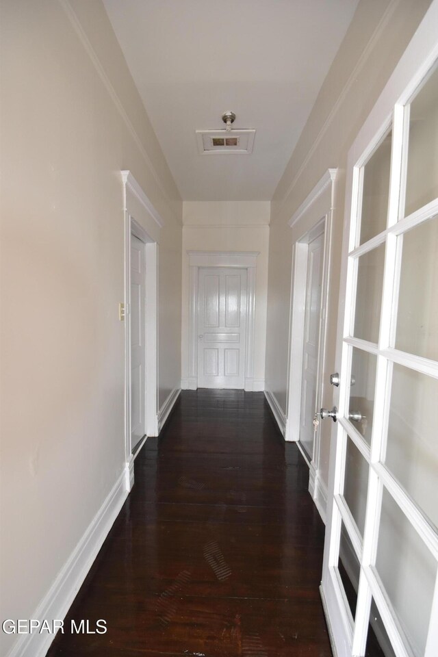 1275 Prospect St, El Paso, TX 79902 - corridor featuring dark wood finished floors