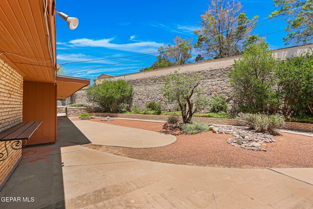 408 Spring Hill Cir, El Paso, TX 79912 - fenced backyard featuring a patio area