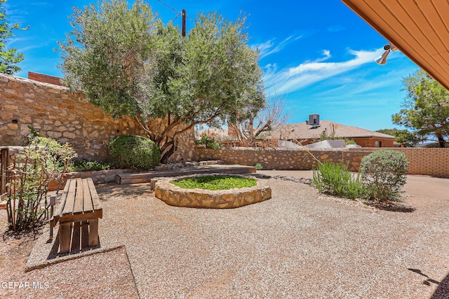 408 Spring Hill Cir, El Paso, TX 79912 - fenced backyard with a patio