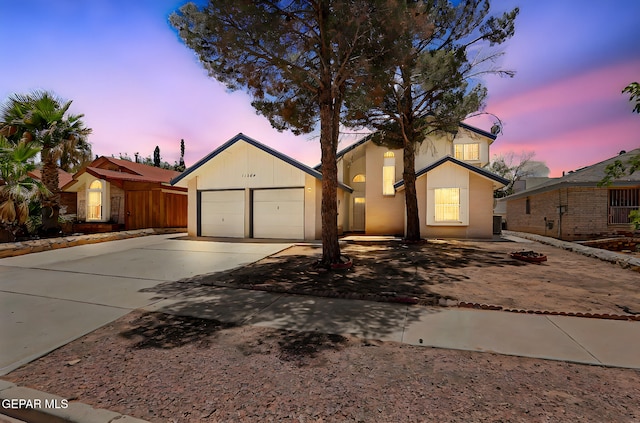 11364 Crater Lake Ave, El Paso, TX 79936 - view of front facade with concrete driveway and a garage