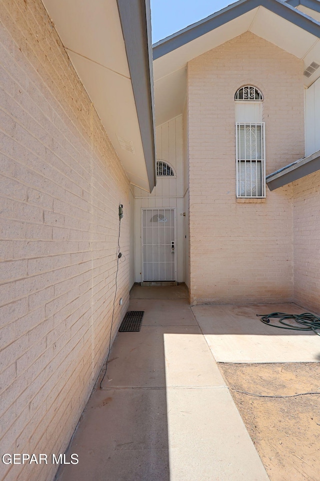 11364 Crater Lake Ave, El Paso, TX 79936 - property entrance featuring brick siding