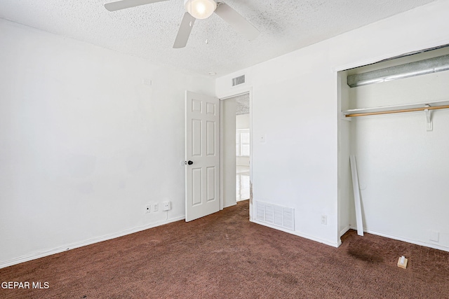 11364 Crater Lake Ave, El Paso, TX 79936 - unfurnished bedroom with carpet floors, a textured ceiling, a closet, ceiling fan, and baseboards
