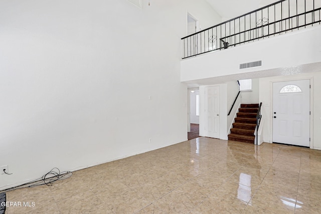 11364 Crater Lake Ave, El Paso, TX 79936 - entrance foyer with stairway and a high ceiling