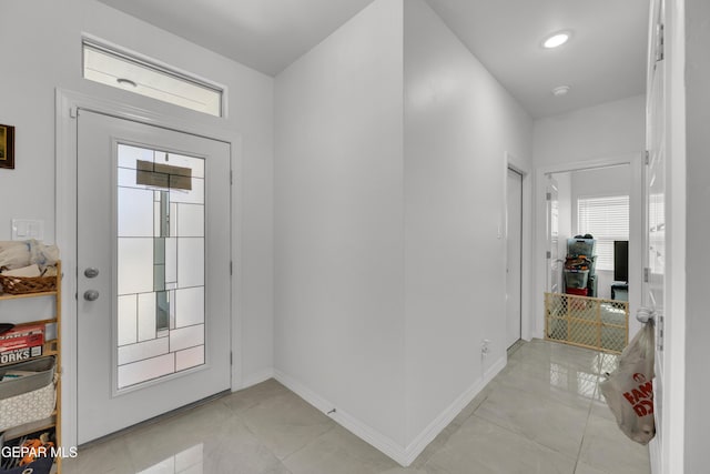 14423 Kayla Mia Dr, El Paso, TX 79938 - entryway with light tile patterned flooring and baseboards