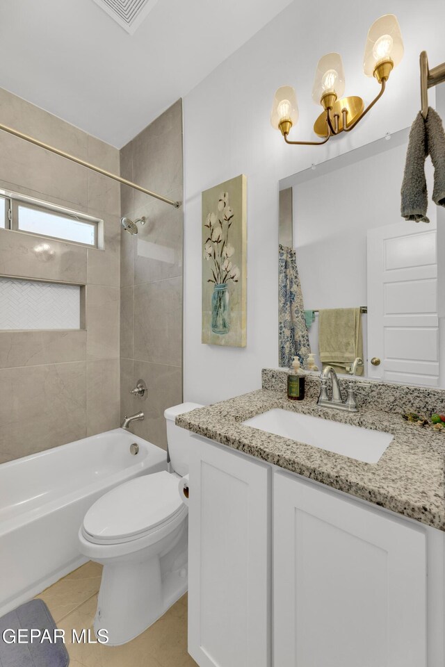 14423 Kayla Mia Dr, El Paso, TX 79938 - bathroom with vanity, toilet, shower / bath combo with shower curtain, and tile patterned flooring