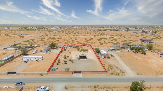 4821 Kreuger St, El Paso, TX 79938 - aerial view of sparsely populated area with property boundaries highlighted and a desert landscape