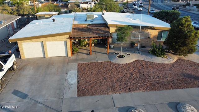 7000 Armistad Ave, El Paso, TX 79912 - view of front of house featuring concrete driveway and brick siding