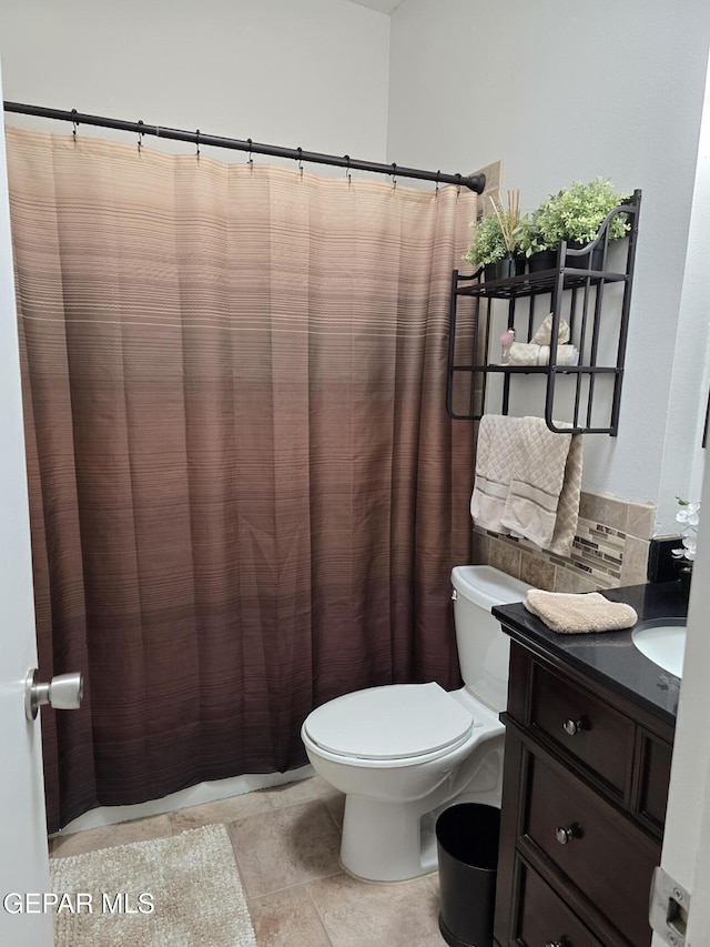 7000 Armistad Ave, El Paso, TX 79912 - full bathroom with vanity and a shower with curtain