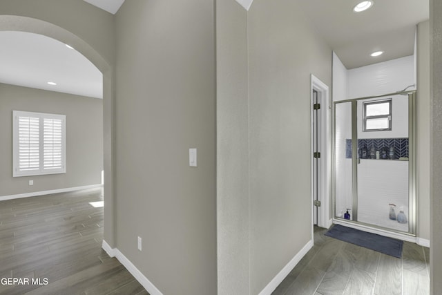 912 Malven Pl, El Paso, TX 79928 - corridor with arched walkways, recessed lighting, and healthy amount of natural light