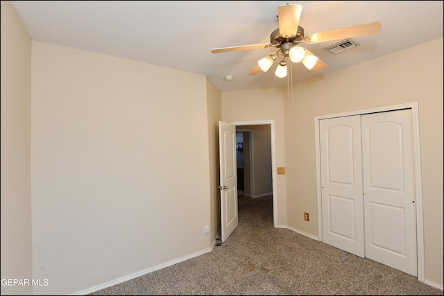 12712 Tierra Aurora Dr, El Paso, TX 79938 - unfurnished bedroom featuring carpet, a closet, and a ceiling fan