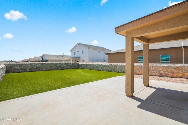 11470 Dawn View Rd Unit B, Socorro, TX 79927 - fenced backyard with a patio