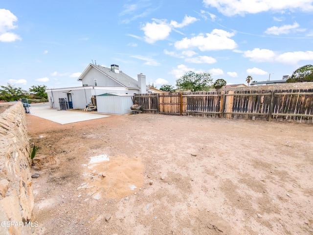 3425 Dialrock Ln, El Paso, TX 79935 - fenced backyard featuring a patio