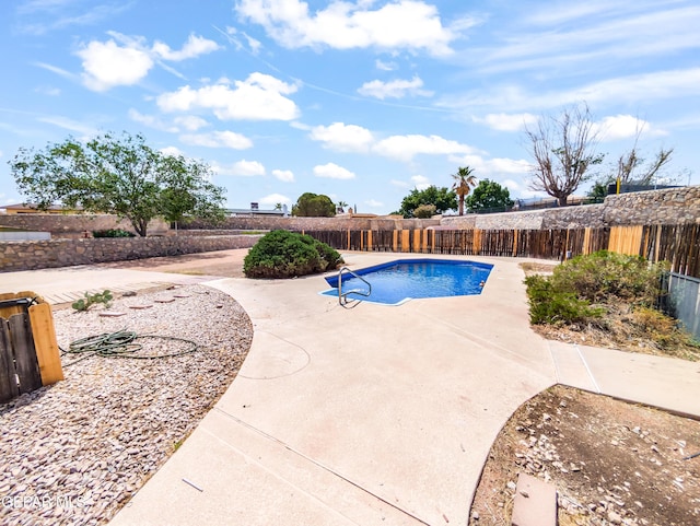 3425 Dialrock Ln, El Paso, TX 79935 - view of pool with a patio area and a fenced backyard