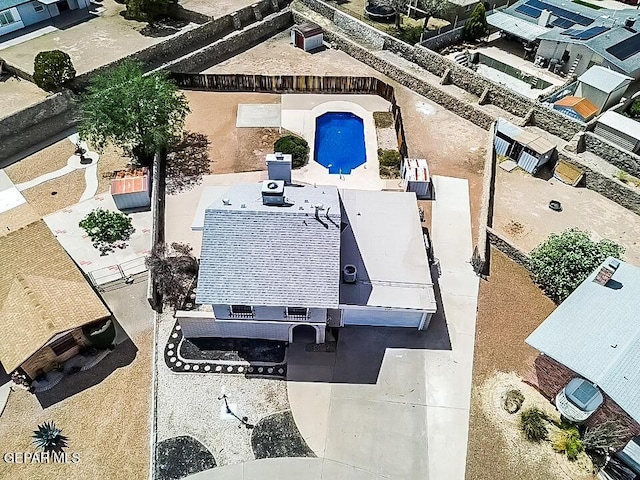 3425 Dialrock Ln, El Paso, TX 79935 - aerial view of property and surrounding area with a pool