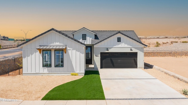 905 Bilton Pl, El Paso, TX 79928 - modern inspired farmhouse featuring board and batten siding, a garage, and concrete driveway
