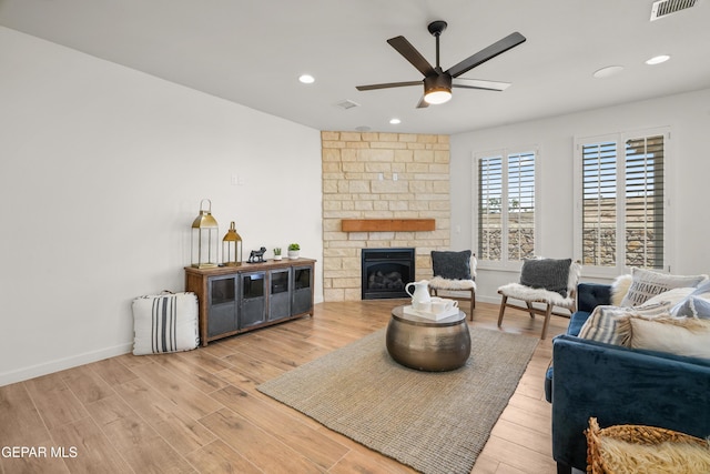 905 Bilton Pl, El Paso, TX 79928 - living room with a ceiling fan, wood finished floors, a stone fireplace, and recessed lighting