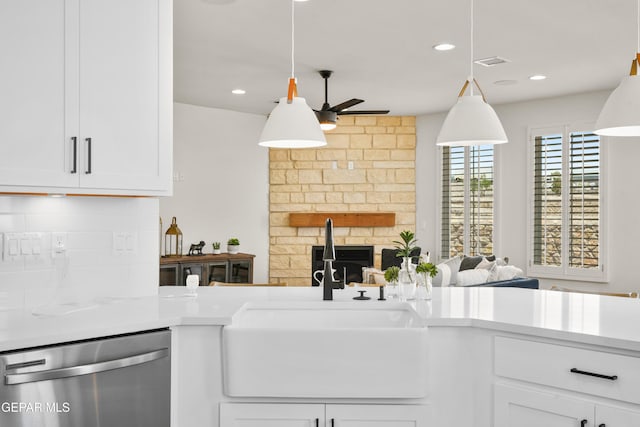 905 Bilton Pl, El Paso, TX 79928 - kitchen featuring dishwasher, a fireplace, ceiling fan, light countertops, and recessed lighting