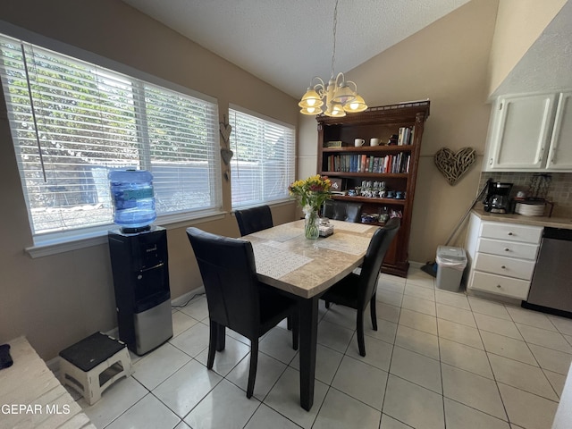 2009 Bobby Jones Dr Unit B, El Paso, TX 79936 - dining space with vaulted ceiling, a chandelier, light tile patterned flooring, and a textured ceiling