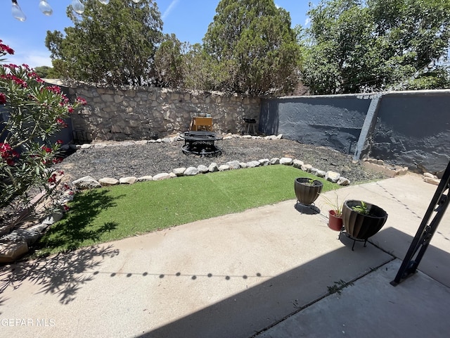 2009 Bobby Jones Dr Unit B, El Paso, TX 79936 - view of patio featuring a fire pit