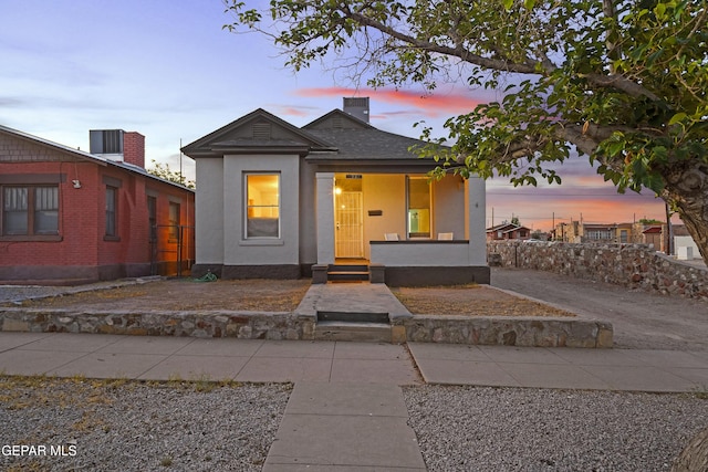 3031 Memphis Ave, El Paso, TX 79930 - view of front of property featuring stucco siding and covered porch