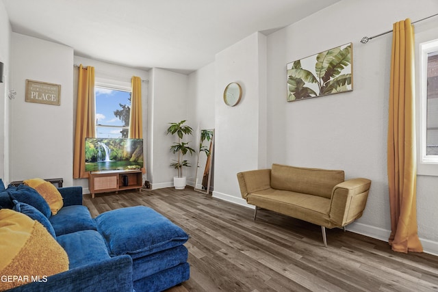 3031 Memphis Ave, El Paso, TX 79930 - living area with wood finished floors and baseboards