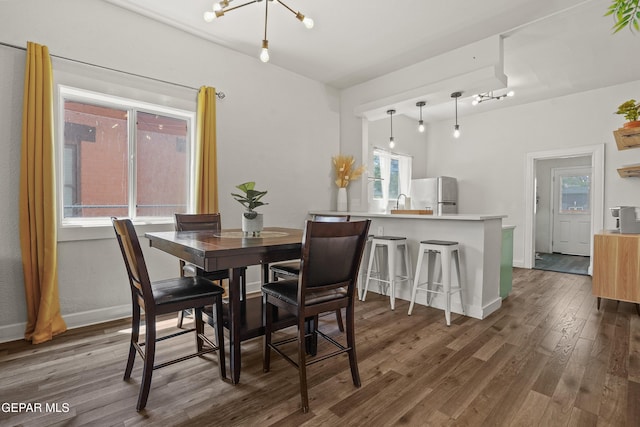 3031 Memphis Ave, El Paso, TX 79930 - dining space with dark wood-style flooring and track lighting