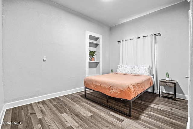 3031 Memphis Ave, El Paso, TX 79930 - bedroom with wood finished floors and baseboards