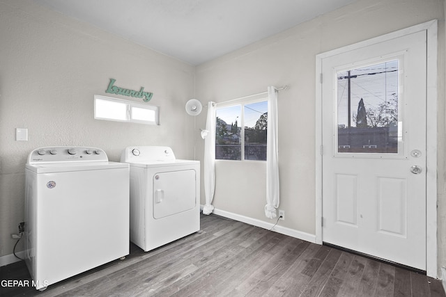 3031 Memphis Ave, El Paso, TX 79930 - laundry area with washing machine and clothes dryer and wood finished floors