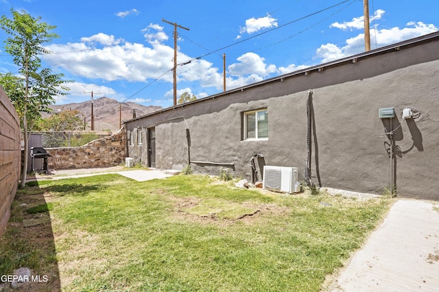 3031 Memphis Ave, El Paso, TX 79930 - view of property exterior with stucco siding and a mountain view