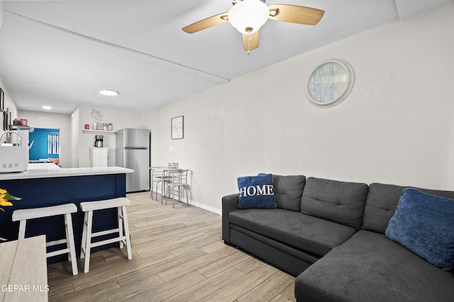 3031 Memphis Ave, El Paso, TX 79930 - living area featuring light wood-style floors and ceiling fan