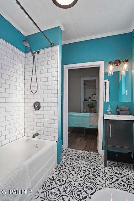 3031 Memphis Ave, El Paso, TX 79930 - full bathroom featuring crown molding, vanity, shower / bath combination, and ensuite bathroom