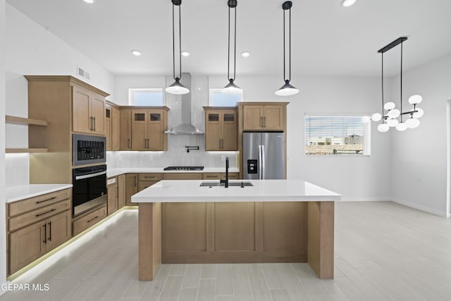 3932 Surmise St, El Paso, TX 79938 - kitchen with stainless steel fridge, black oven, open shelves, wall chimney range hood, and tasteful backsplash