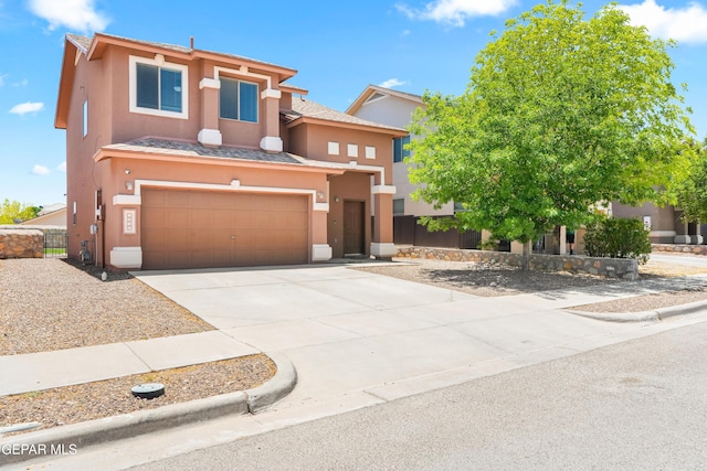 5036 Silver Ranch Ave, El Paso, TX 79934 - view of front of property with stucco siding, concrete driveway, and an attached garage